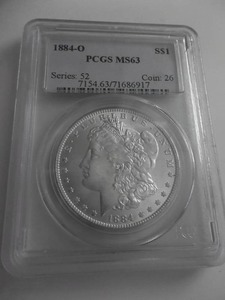 lot 5 image: 1884 O Morgan Silver Dollar