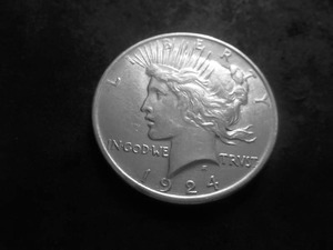 lot 52 image: 1924 Peace Silver Dollar