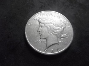 lot 63 image: 1928 S Silver Peace Dollar