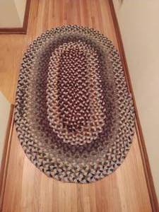 lot 386 image: Old Braided Rug