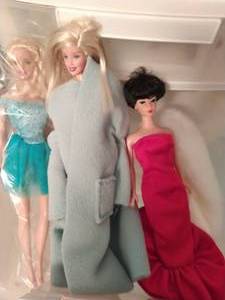 lot 305 image: Three Barbies