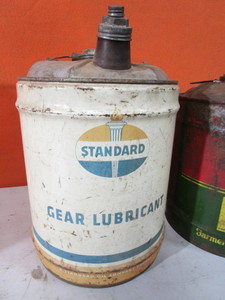 Vintage 5 gal Oil Cans