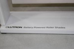 lot 118 image: Lutron Battery Powered Window Roller Shade with Remote Control - Demonstration Model
