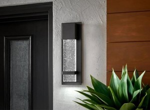 lot 481 image: Home Decorators Collection 1-Light Black LED Integrated Outdoor Sconce Lantern Light with Seeded Glass