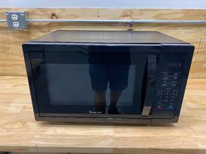 lot 23 image: MAGIC CHEF 1.6 cu. ft. Countertop Microwave in Black with Gray Cavity