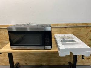 lot 26 image: AMANA 1.6 cu. ft. Over the Range Microwave in Stainless Steel