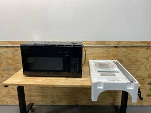 lot 27 image: Unbranded 1.6 cu. ft. Over the Range Microwave in Black