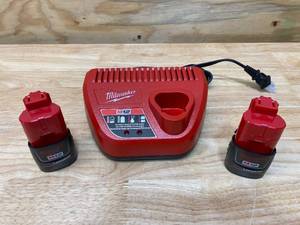 lot 51 image: MILWAUKEE M12 12-Volt Lithium-Ion Battery Charger with 2- M12 12-Volt Lithium-Ion Compact Battery Packs (1.5Ah)