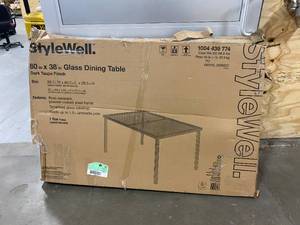 lot 89 image: STYLEWELL 60 in. x 38 in. Mix and Match Steel Rectangular Outdoor Patio Dining Table with Glass Top (missing 2 legs)