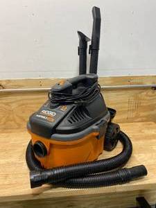 lot 101 image: RIDGID 4 Gallon 5.0-Peak HP Portable WetDry Shop Vacuum with Fine Dust Filter, Hose and Accessories