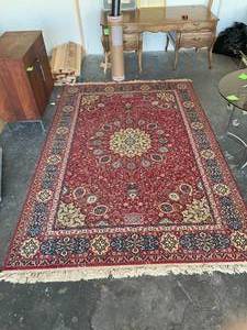 lot 57 image: Karastan Machine Made Wool Rug 10 ft x 6 ft 7 in