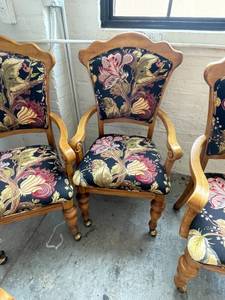 lot 192 image: Four Upholstered Arm Chairs with Wheeled Feet
