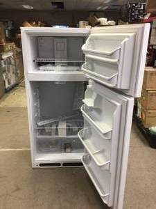 lot 2 image: 18 cu. ft. Top Freezer Refrigerator in White by Frigidaire Damaged on side See Pictures