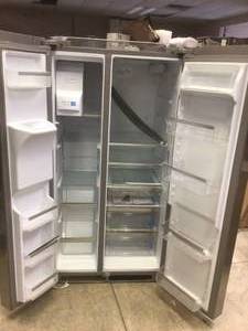lot 14 image: Frigidaire 25.6 Cu.Ft. 36 in. Standard Depth Side by Side Refrigerator in Stainless Steel see pictures