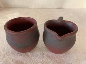 lot 33 image: Van Briggle Cream and Sugar Set