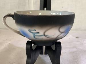 lot 53 image: 3D Dragon Embellished Tea Cup