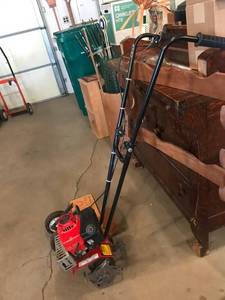 lot 5 image: Troy Bilt Mini-Tiller with Edging Attachment