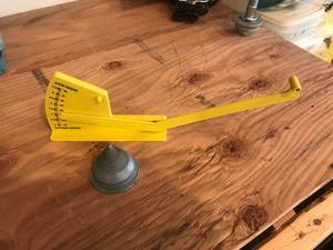 lot 133 image: Lawn Mower Blade Balancer & Cutting Height Gauge