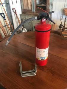 lot 207 image: Garage Brackets & Fire Extinguisher