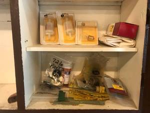 lot 212 image: John Deere Parts on 2 Shelves
