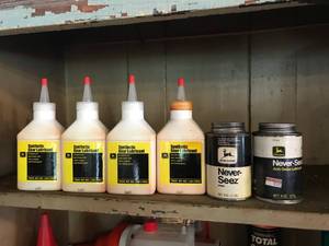 lot 72 image: John Deere items on Shelf