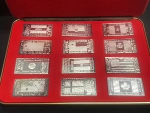lot 267 image: The Silver Mint 12 Piece Set The Silver Nations Ingots 20 Grams .999 Silver Each