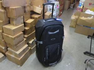 lot 106 image: (D-4) Tall Oakley Travel Bag...