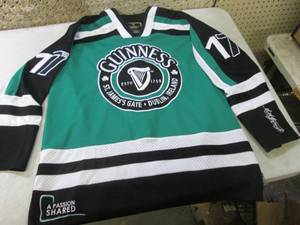 lot 129 image: (E-2) Guinness Jersey Size Large...