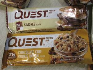 lot 279 image: (B-3) 24 Assorted Quest Protein Bar...