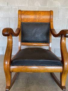 lot 33 image: Solid Oak Rocking Chair