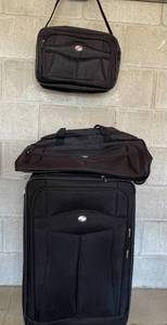 lot 34 image: Three American Tourist Luggage Bags