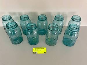 lot 84 image: Lot of 9 Various Ball & Atlas Quart Blue Mason Jars-Imperfect