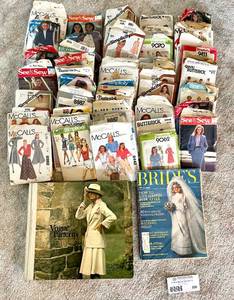 lot 220 image: Lot of Vintage Adult Sewing Patterns and Guides.