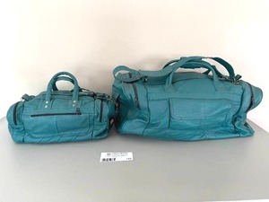 lot 123 image: 2 Genuine Leather Teal Duffle Bags Made in Mexico