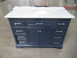 lot 22 image: Home Decorators Collection Windlowe 49 in. W x 22 in. D x 35 in. H Bath Vanity in Navy Blue with Carrara Marble Vanity Top in White with White Sink 15101-VS49C-NG