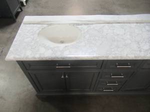 lot 27 image: Home Decorators Collection Windlowe 73 in. W x 22 in. D x 35 in. H Bath Vanity in Gray with Carrara Marble Vanity Top in White with White Sink 15101-VS73C-GR