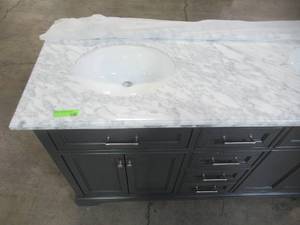 lot 36 image: Home Decorators Collection Windlowe 61 in. W x 22 in. D x 35 in. H Bath Vanity in Navy Blue with Carrara Marble Vanity Top in White with White Sink 15101-VS61C-NB
