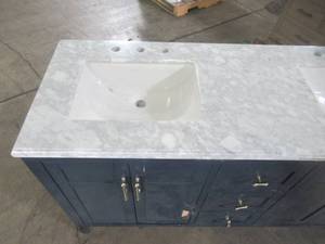 lot 41 image: Home Decorators Collection Sturgess 61 in. W x 22 in. D Bath Vanity in Navy Blue with Marble Vanity Top in Carrara White with White Basins 19111-VS61-NB