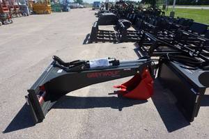 lot 12 image: Brand New Grey Wolf Brand Universal Mount Bobcat Skid Loader Skid Steer Hydraulic Back Hoe Attachment