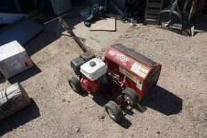 lot 38 image: Brown Bed Edger Model F991 Commercial Bed Edger