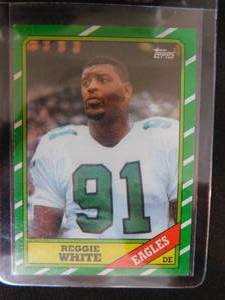 lot 95 image: 1986 Topps Reggie White Rookie Card #275