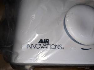 lot 81 image: Air Innovations Desktop Dehumidifier