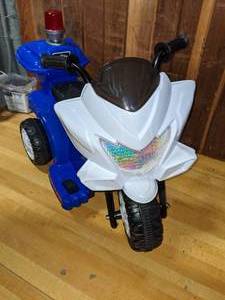lot 78 image: National Products Toddler Ride On Motorcycle