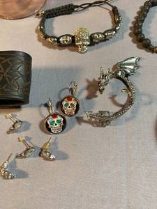 Collection of Jewelry Depicting Skulls, Dragons and More