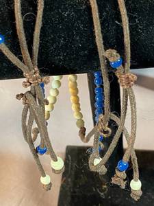 Four Vintage Leather and Bead Slipknot Bracelets