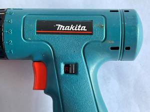 lot 360 image: Makita 38 Drill with Charger and 2 Batteries