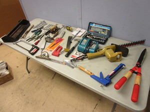 lot 214 image: BLACK & DECKER ELECTRIC HEDGE TRIMMER, ASSTD. HANDLAWN TOOLS, MAKITA CHARGER, WRENCHES, MORE