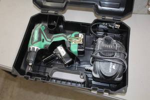 lot 74 image: Hitachi DS10DFL2 10.8V Cordless Driver Drill  with Plastic Case, Batteries (x2), Charger