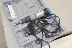 lot 73 image: Dremel 10.8V Cordless Lithium Ion Rotary Tool  with Plastic Case, Battery, Charger