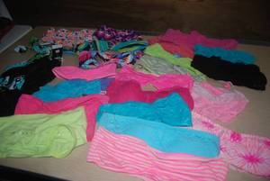 lot 35 image: 25 or more swimsuit tops or wear un...